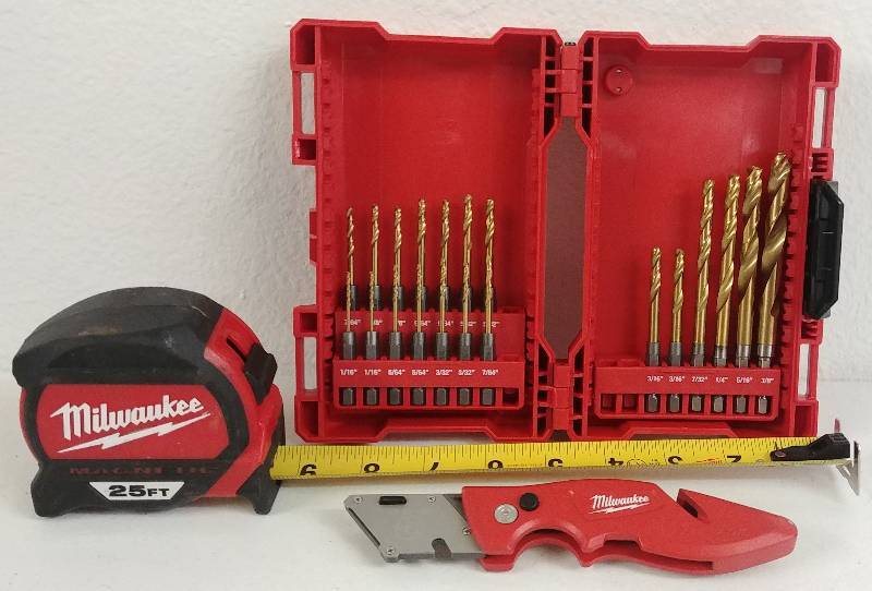 lot 52 image: Milwaukee RedHelix Drill Bit set PLUS 25 tape measure, Flip Knife.