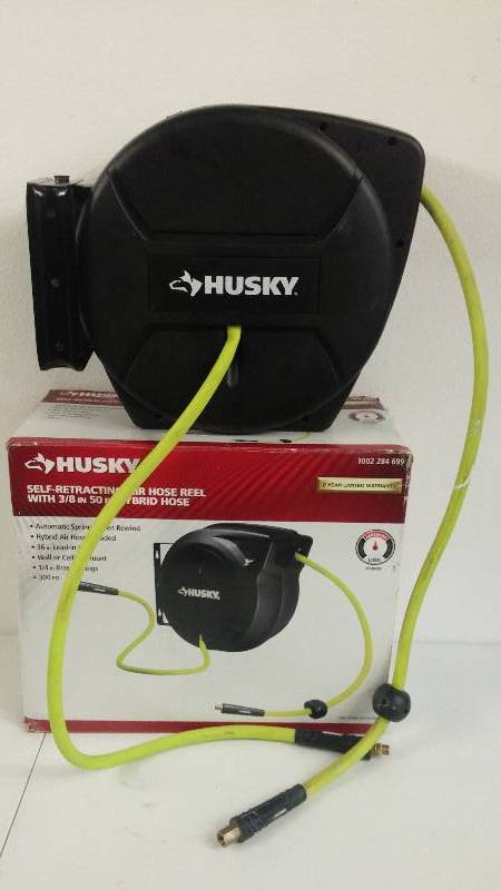 lot 92 image: Husky Self-Retracting Air Hose Reel with 38 X 50 Hybrid Hose