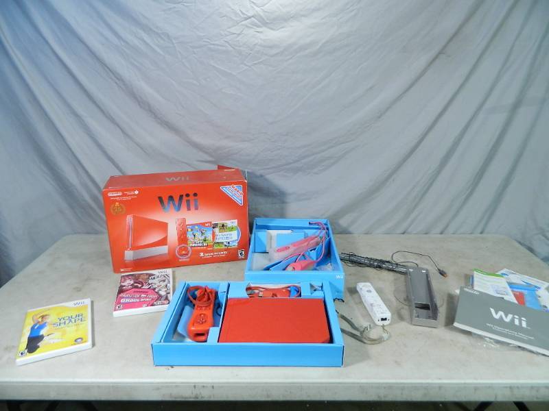 lot 90 image: Red Wii Console and More