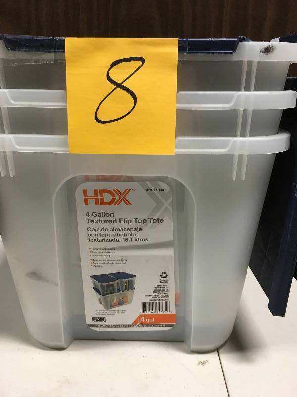 lot 8 image: Lot of 3- 4 Gal. Clear Storage Tote with Blue Flip Top not used