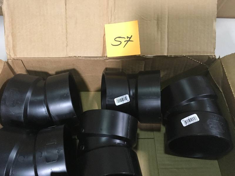 lot 57 image: Lot of 5 - 4 in. ABS DWV 22-12-Degree Hub x Hub Elbow not used