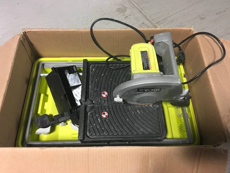 lot 89 image: Ryobi  7 in. Overhead Wet Tile Saw  used in good working conditions