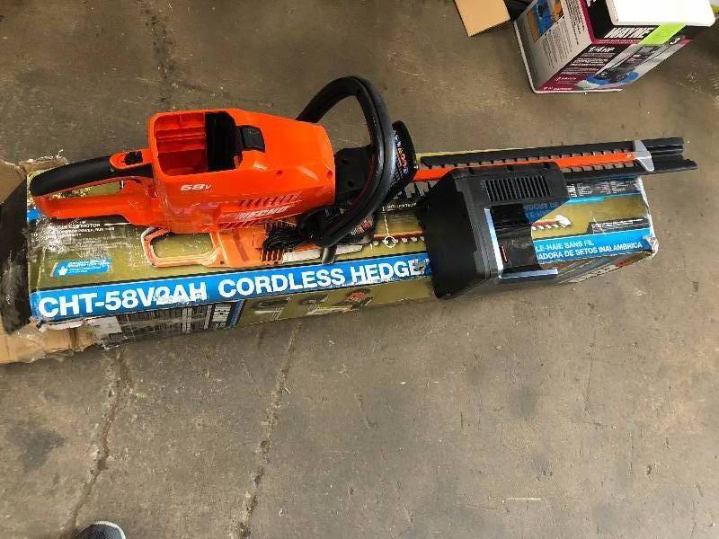 lot 140 image: Echo 24 in. 58-Volt Lithium-Ion Brushless Cordless Hedge Trimmer -Battery r are not include in working conditions tool and charger only