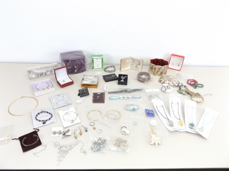 lot 27 image: Large Lot of NEW Costume Jewelry with Some Sterling