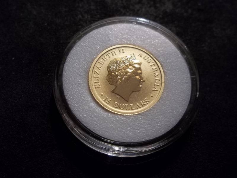 lot 2 image: 2015 Australian Kangaroo 15 Dollar Gold Piece 110 OZ .9999 Gold In Air Tight Capsule