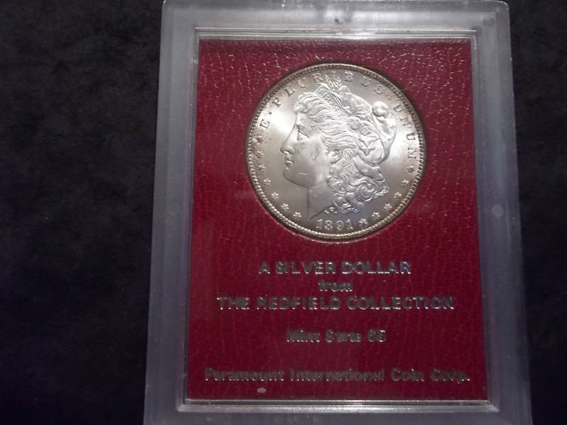 lot 5 image: 1891 S Morgan Silver Dollar Graded MS65 From The Redfield Collection Holdered