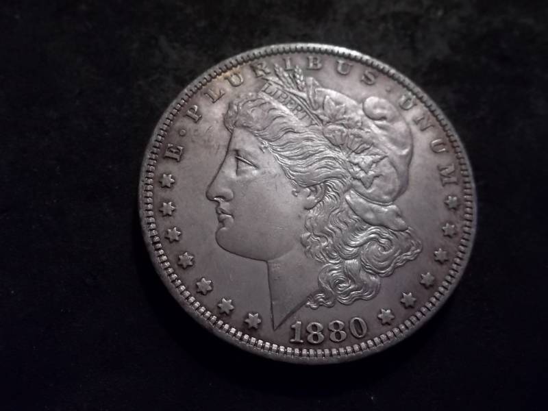 lot 11 image: 1880 Morgan Silver Dollar