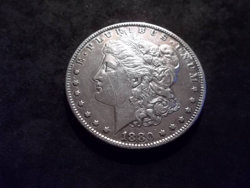 lot 12 image: 1880 O Morgan Silver Dollar