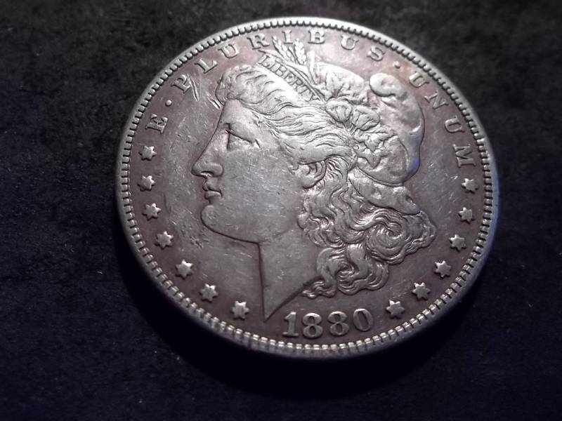 lot 13 image: 1880 S Morgan Silver Dollar