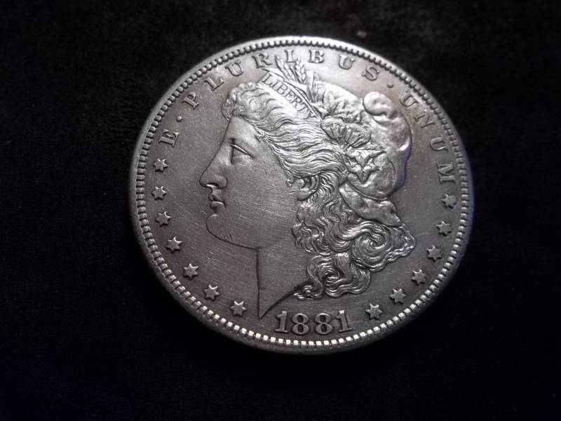 lot 16 image: 1881 S Morgan Silver Dollar
