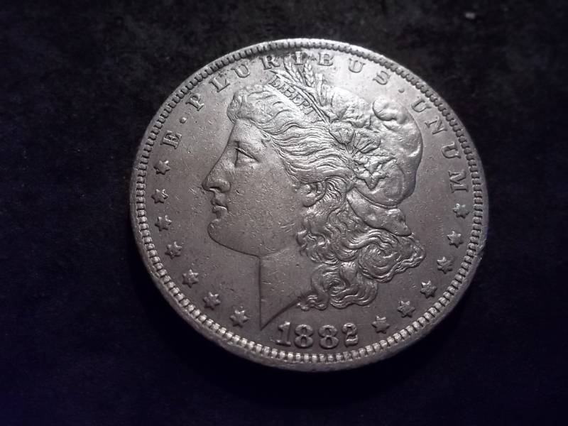 lot 18 image: 1882 O Morgan Silver Dollar