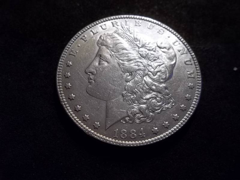 lot 23 image: 1884  Morgan Silver Dollar