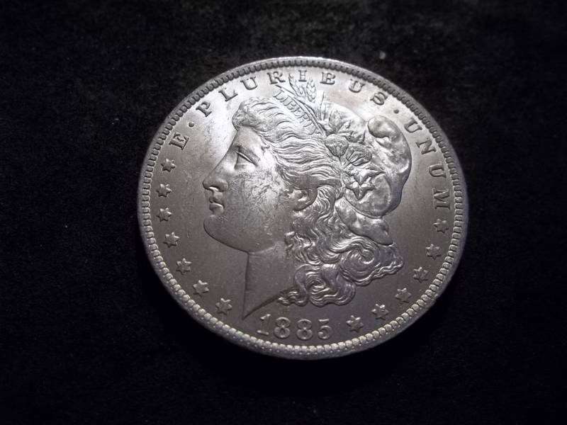 lot 27 image: 1885 O Morgan Silver Dollar