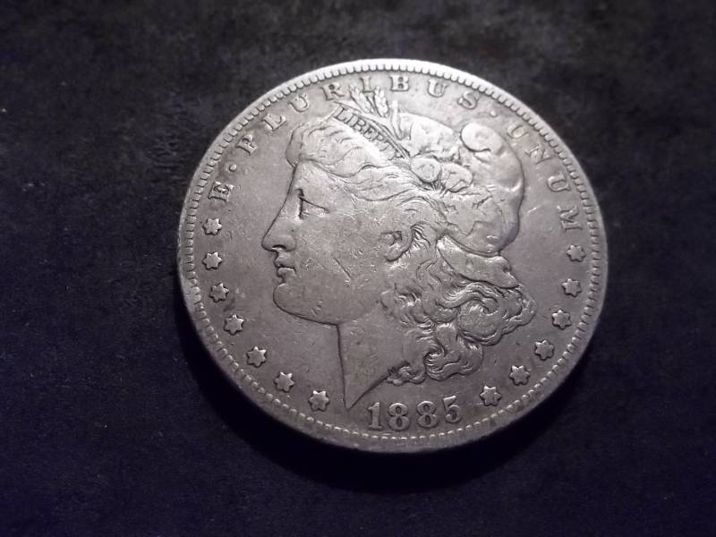 lot 28 image: 1885 S Morgan Silver Dollar