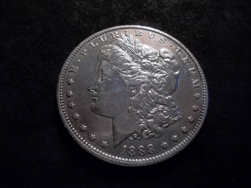 lot 34 image: 1888 O Morgan Silver Dollar