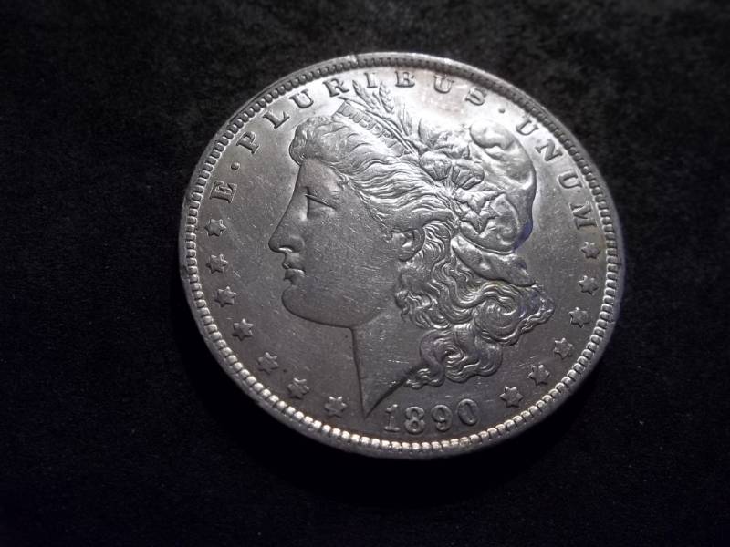 lot 38 image: 1890 O  Morgan Silver Dollar