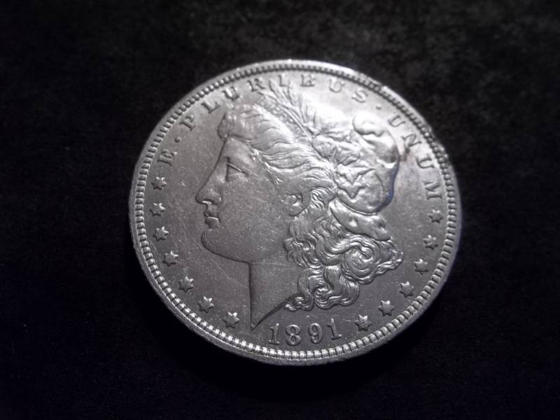 lot 41 image: 1891 O Morgan Silver Dollar