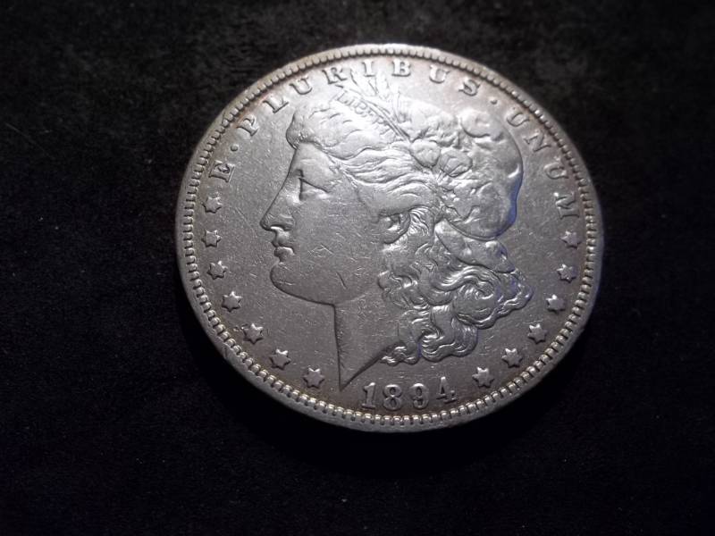 lot 45 image: 1894 O Morgan Silver Dollar