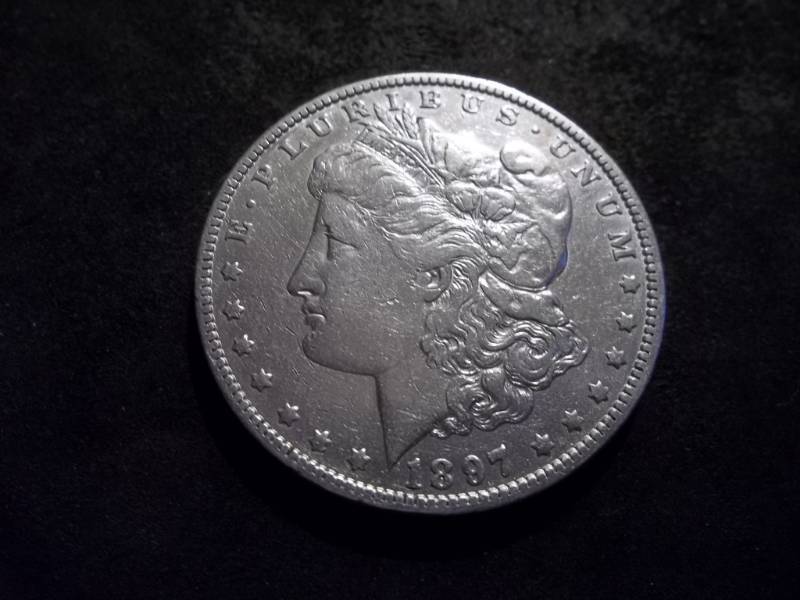 lot 50 image: 1897 O Morgan Silver Dollar