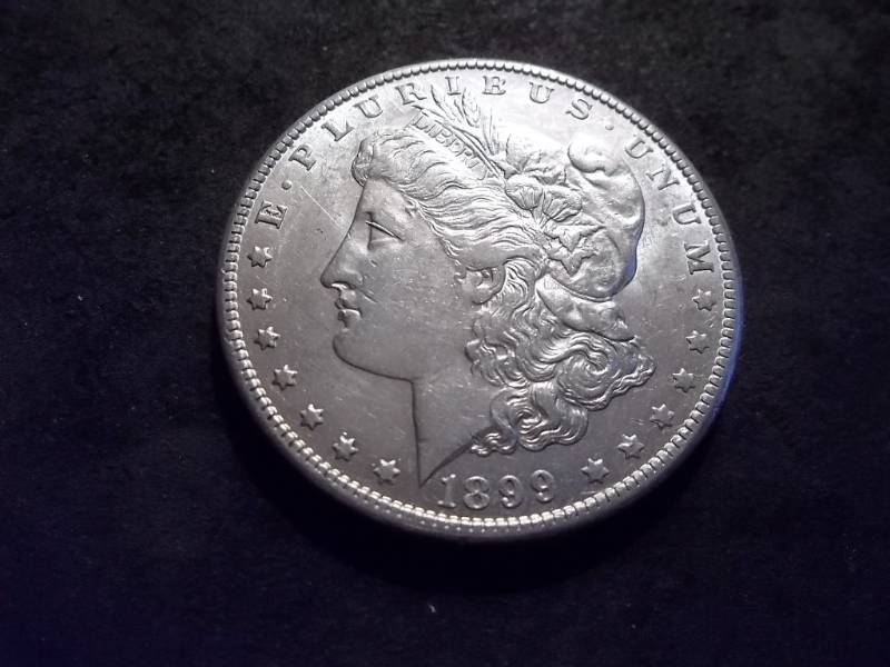 lot 56 image: 1899 O Morgan Silver Dollar