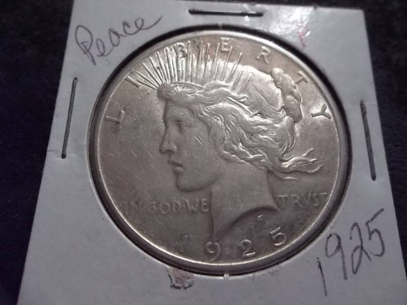 lot 90 image: 1925 Peace Silver Dollar