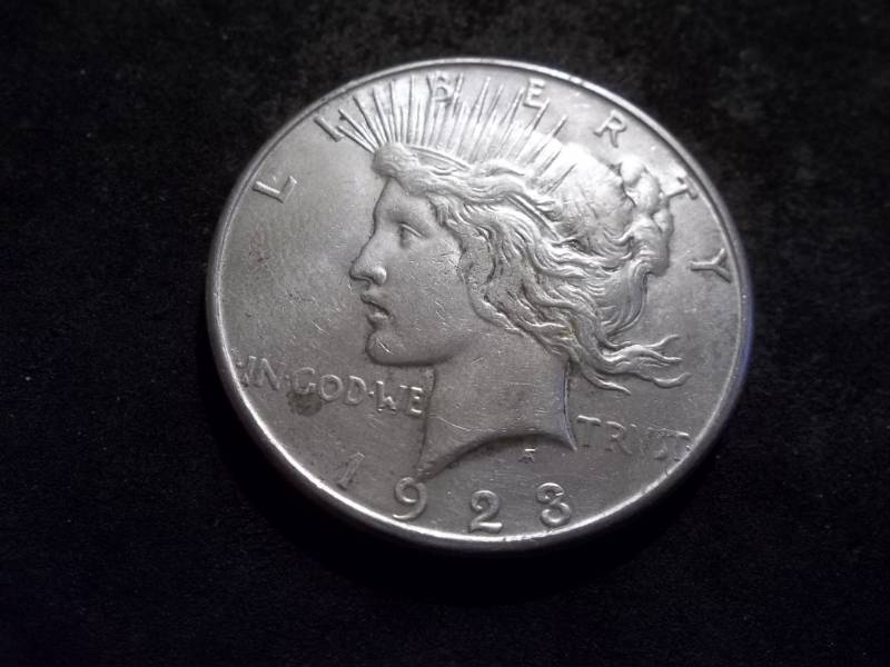 lot 99 image: 1928 S Silver Peace Dollar