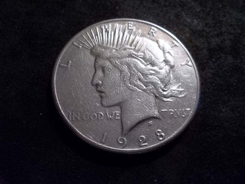 lot 100 image: 1928 S Silver Peace Dollar