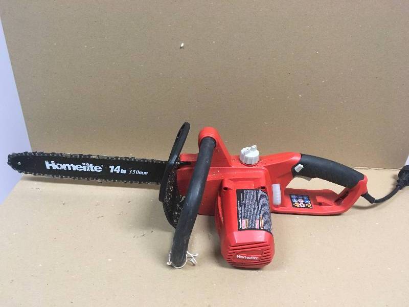 lot 22 image: Homelite UT-43104 - Homelite 14 Chainsaw, 42cc used in working condition