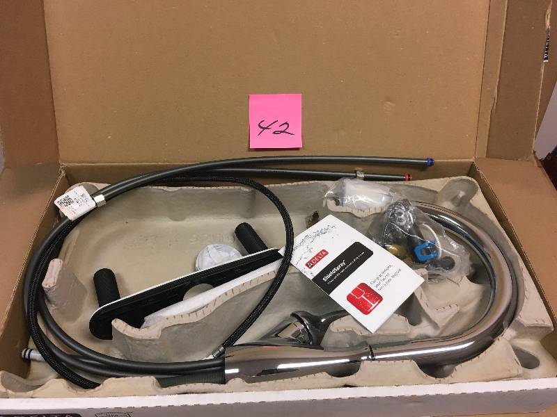 lot 42 image: Delta 9178-DST Leland Pull-Down Kitchen Faucet with Magnetic Docking Spray Head not used