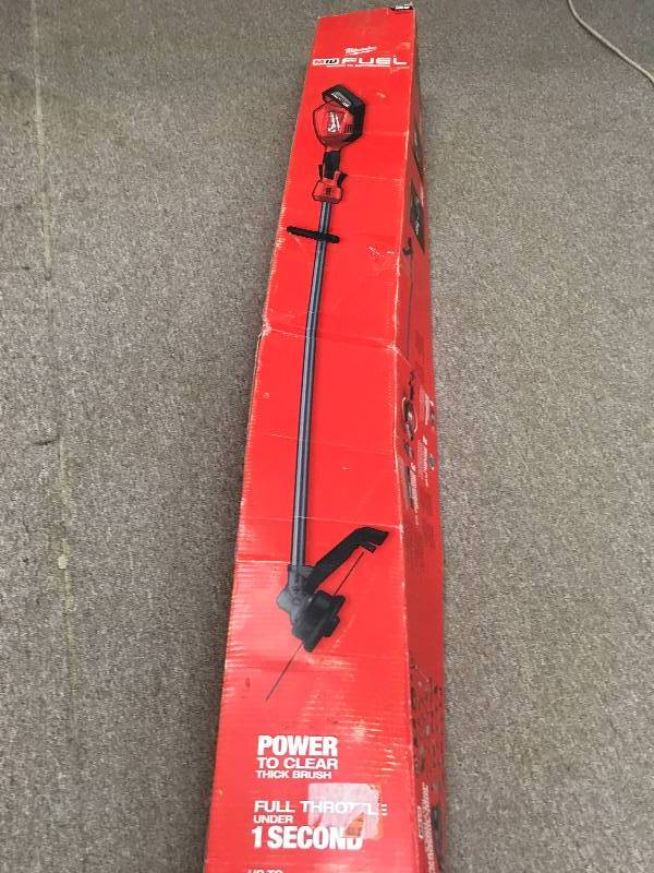 lot 51 image: Milwaukee 2725-20 M18 FUEL String Trimmer (Tool Only) open box in like new condition