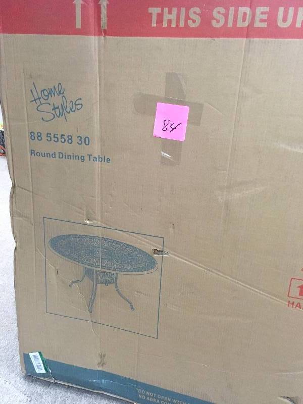 lot 84 image: Home Styles Floral Blossom 42 in. Round Patio Dining Table not used