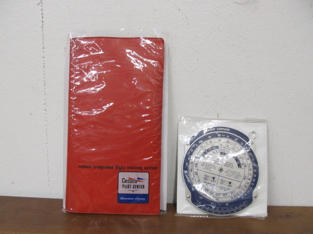 lot 161 image: Vintage CESSNA Flight Training Packet & Flight Computer