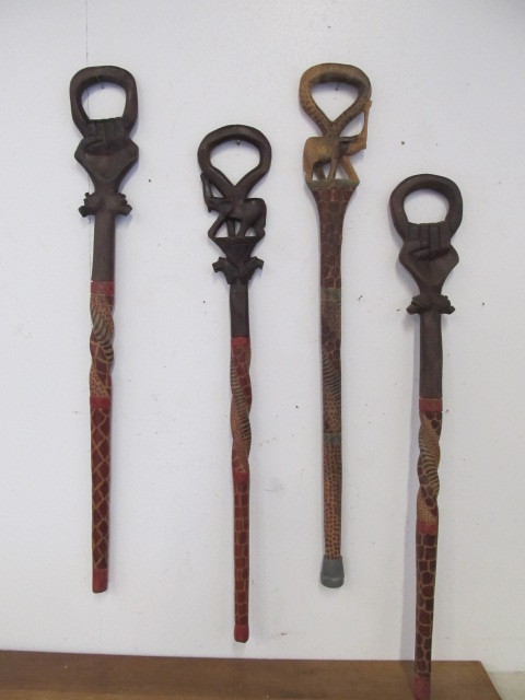 lot 19 image: Lot of 4 Hand Carved & Painted African CanesWalking Sticks