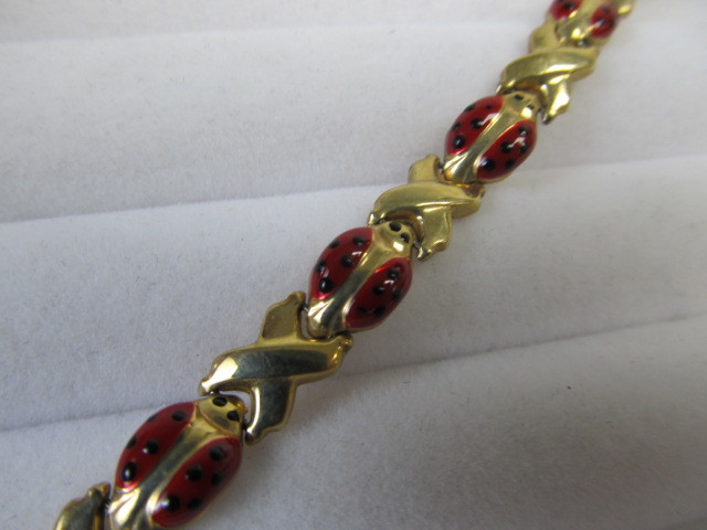 lot 87 image: Vintage Signed 10K GOLD Bracelet - Ladybug Design