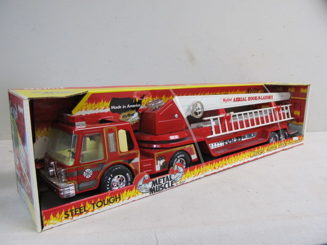 lot 122 image: LARGE Vintage Steel Nylint Aerial Ladder Fire Truck - NEW IN BOX