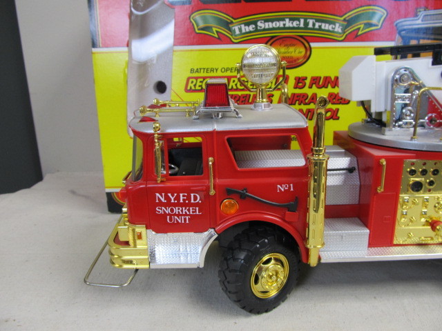 lot 128 image: Large Vintage New Bright Snorkel Unit Fire Engine wBox
