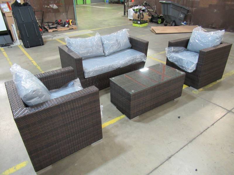 lot 7 image: LAGO COLLECTION ISLES 4-PIECE OUTDOOR PATIO SEATING SET.