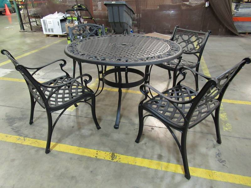 lot 10 image: BISCAYNE 48 ROUND PATIO TABLE AND 4 CHAIRS.