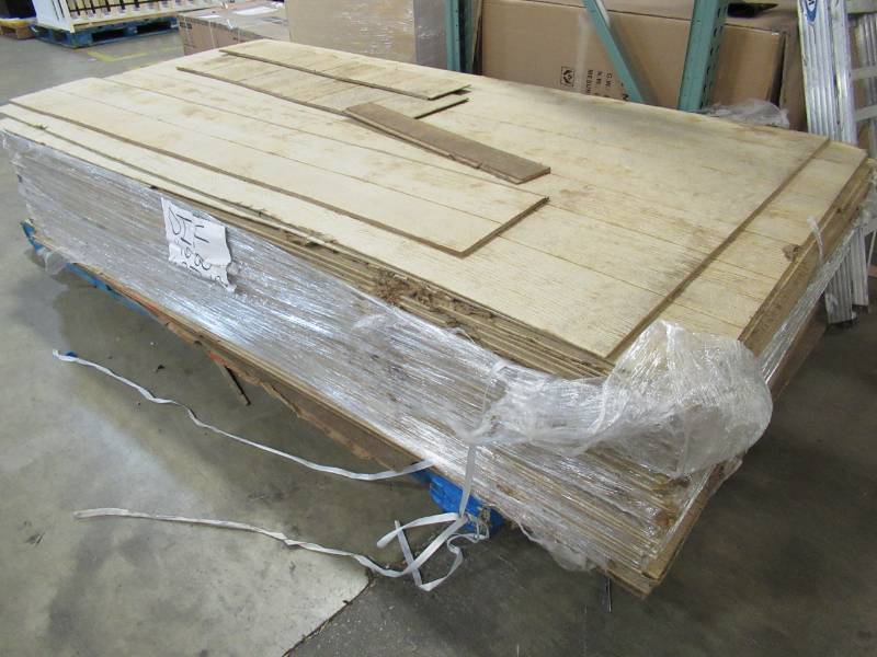 lot 107 image: PALLET OF WALL PANELING, BLOND COLOR.