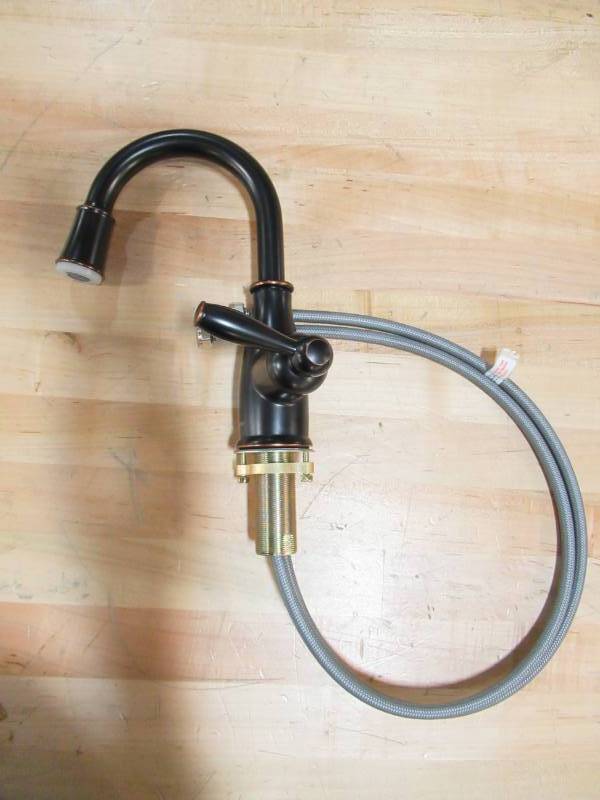 lot 130 image: GLACIER BAY MANDOURI 4 CENTERSET SINGLE HANDLE LED HIGH ARC BATHROOM FAUCET - BRONZE