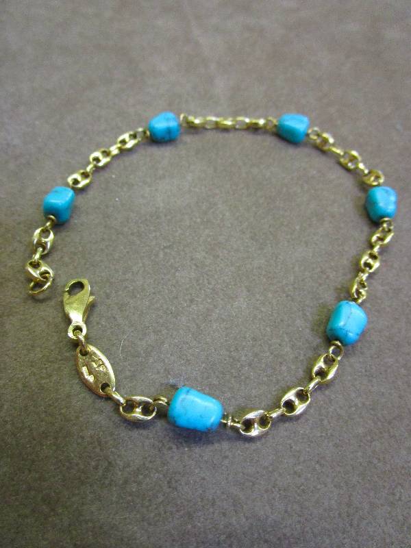 lot 101 image: STAMPED 18K 750 TURQOISE 8 ITALIAN BRACELET 6.8 GRAMS