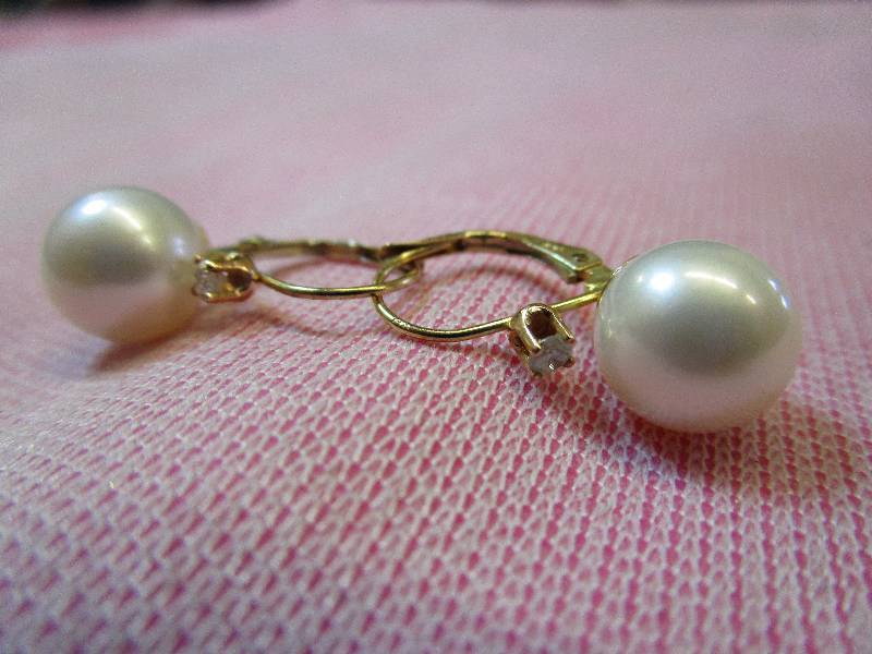 lot 120 image: 14K DIAMOND ACCENT CULTURED PEARL LEVERBACKS. 2.9 GRAMS