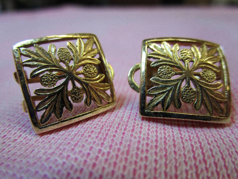 lot 133 image: 14K OMEGA BACK LEAF PATTERN SQUARE PIERCED EARRINGS, 4.3 GRAMS.
