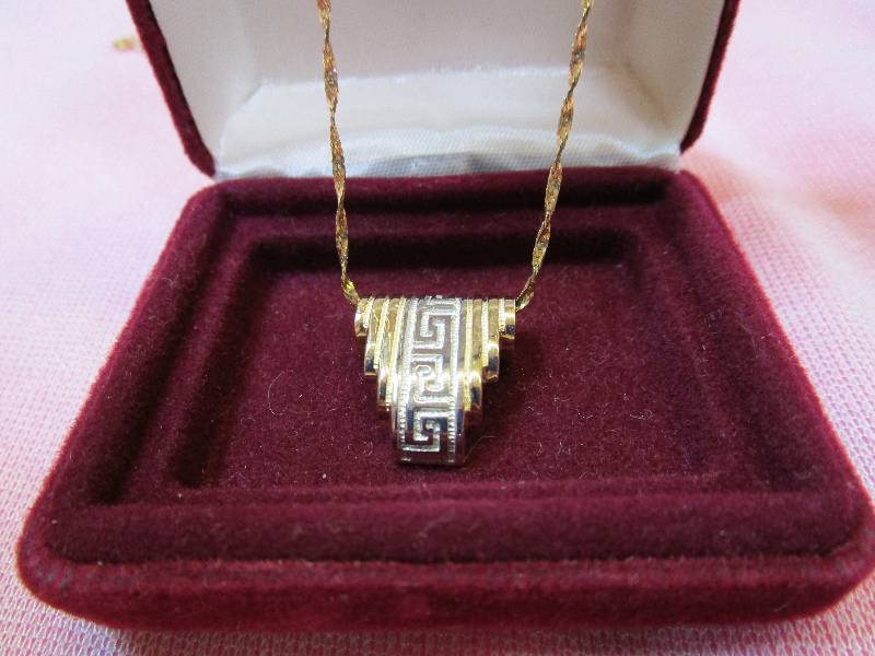 lot 139 image: 14K 18 CHAIN WITH 14K GREEK KEY PENDANT SLIDE, 7.0 GRAMS