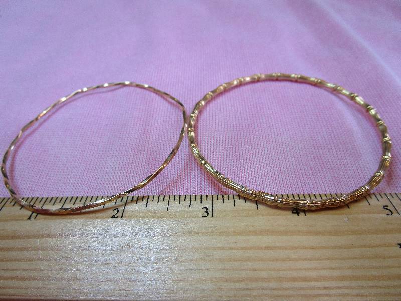 lot 156 image: TWO 14K YELLOW GOLD BANGLES, SMALLER WRIST, 5.3 GRAMS