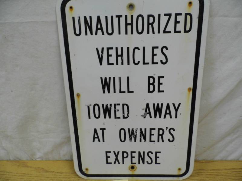 lot 18 image: Unathorized Metal Sign