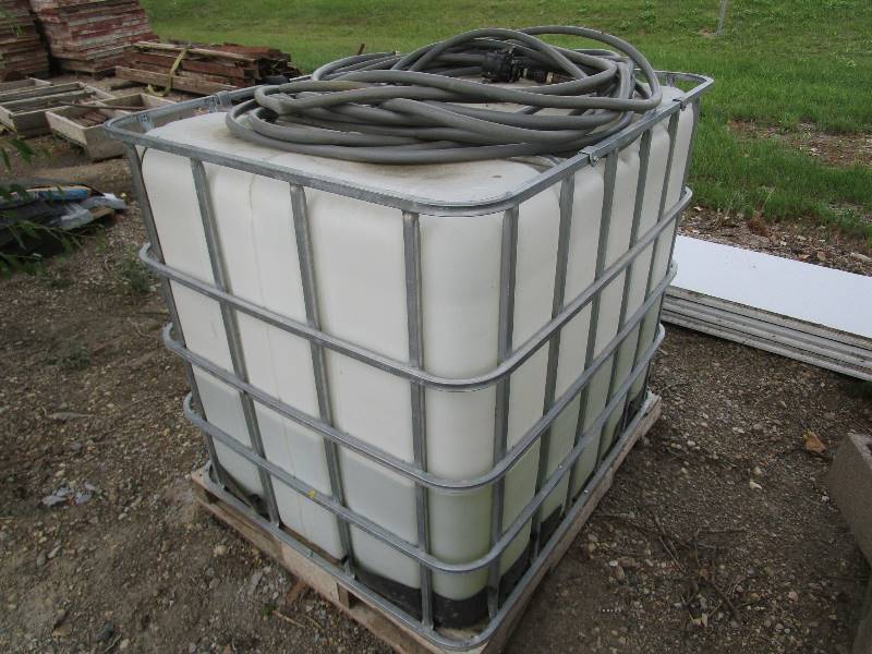 lot 330 image: 175 gal Chemical Tote wHose (used for water)