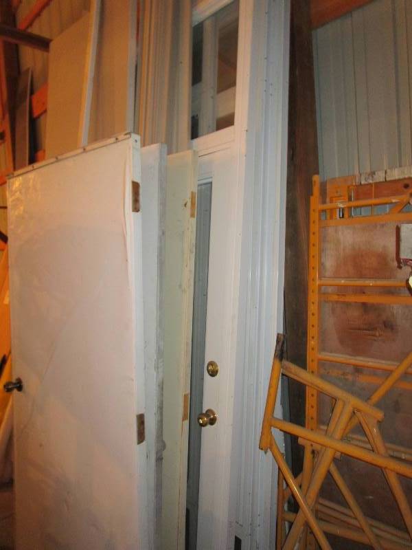 lot 308 image: Large Lot of Doors, Trim & Overhead Door Sections
