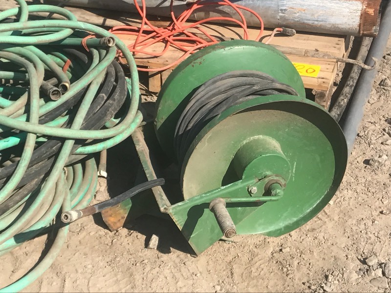 lot 20 image: Garden Hoses, Electric Heaters, Hose Reel, Etc