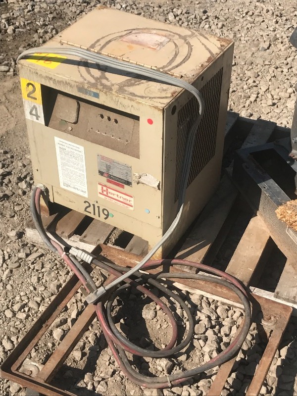 lot 16 image: Battery Charger & Radial Arm Saw